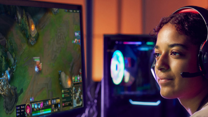 A young woman playing an esports game